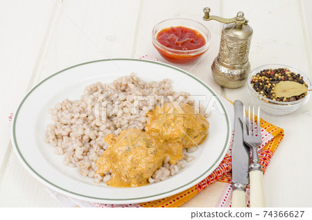 Pearl barley with meat balls. Studio Photo Pearl barley with meat balls. Studio Photo 74366627