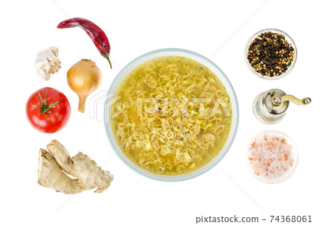 Broth with dry instant noodle. Photo Studio 74368061