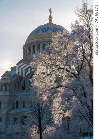 Russia. Kronstadt. St. Nicholas Sea Cathedral on a frosty February day. Russia. Kronstadt. St. Nicholas Sea Cathedral on a frosty February day. 74369173