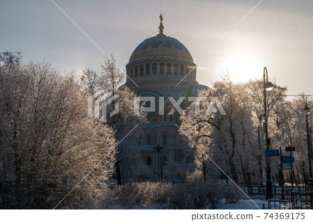 Russia. Kronstadt. St. Nicholas Sea Cathedral on a frosty February day. Russia. Kronstadt. St. Nicholas Sea Cathedral on a frosty February day. 74369175