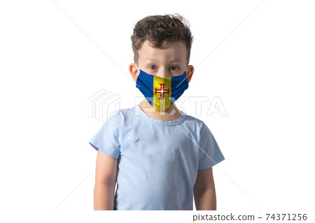 Respirator with flag of Madeira. White boy puts on medical face mask isolated on white background Respirator with flag of Madeira. White boy puts on medical face mask isolated on white background 74371256