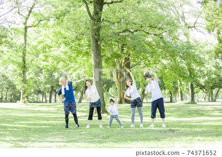 Three-generation family exercise image 74371652