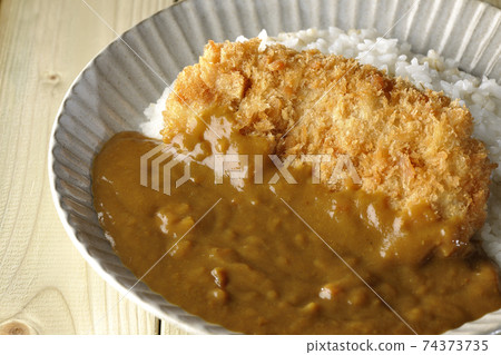 Cutlet curry with a large pork cutlet in the middle Cutlet curry with a large pork cutlet in the middle 74373735