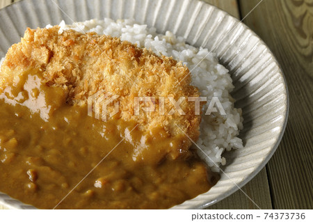 Cutlet curry with a large pork cutlet in the middle Cutlet curry with a large pork cutlet in the middle 74373736