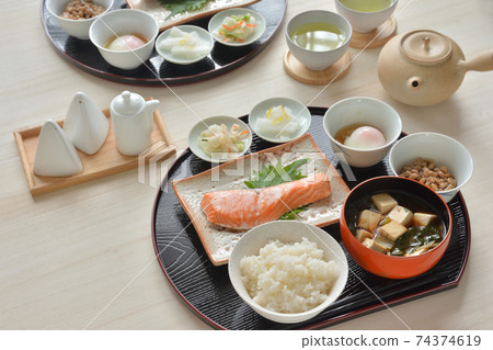 Japanese breakfast, grilled salmon with salt, tofu miso soup Japanese breakfast, grilled salmon with salt, tofu miso soup 74374619