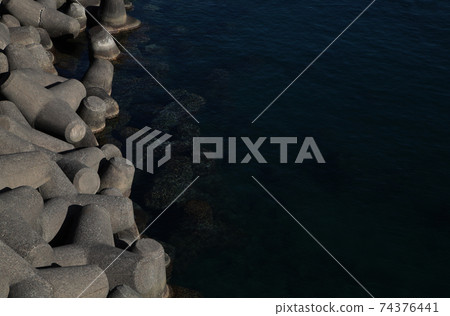 Tetrapod on Solid Calm Day 74376441