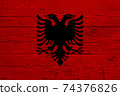 Flag of Albania. Wooden texture of the flag of Albania 74376826