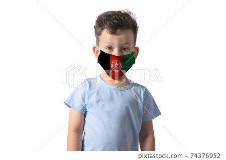 Respirator with flag of Afghanistan. White boy puts on medical face mask isolated on white background Respirator with flag of Afghanistan. White boy puts on medical face mask isolated on white background 74376952