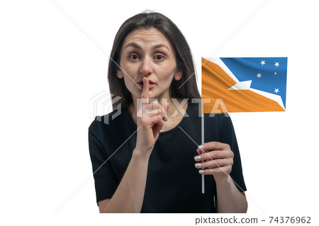 Happy young white woman holding flag of Argentine Antarctica and holds a finger to her lips isolated on a white background Happy young white woman holding flag of Argentine Antarctica and holds a finger to her lips isolated on a white background 74376962
