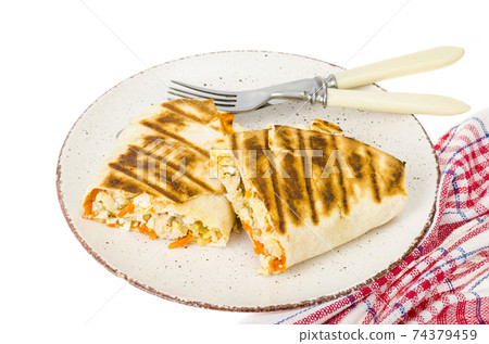 Shawarma, pita, tortilla with chicken and spicy carrots. 74379459