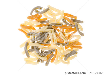 Pile of multi-colored pasta isolated on white background. Pile of multi-colored pasta isolated on white background. 74379465
