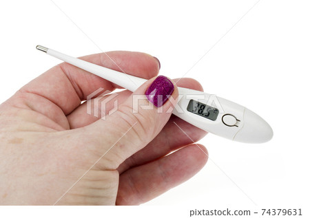 Female hand with electronic thermometer isolated on white background Female hand with electronic thermometer isolated on white background 74379631