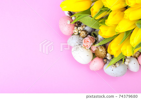 Easter wreath of colorful decorative eggs, flowers Easter wreath of colorful decorative eggs, flowers 74379680