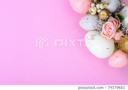 Easter wreath of colorful decorative eggs, flowers 74379681