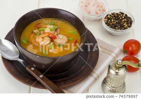 Spicy thai shrimp soup. Studio Photo 74379897