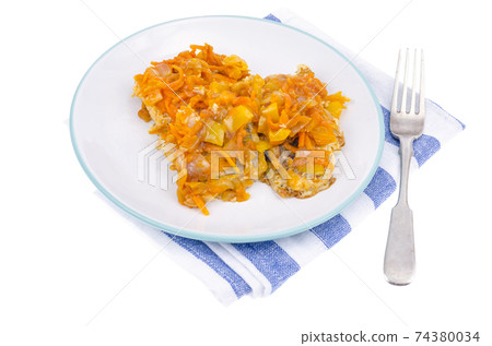 White fish fillet with stewed vegetables. Photo 74380034