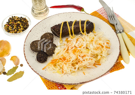 Black sausage with sauerkraut. Studio Photo Black sausage with sauerkraut. Studio Photo 74380171