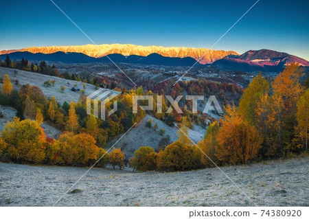 Amazing autumn scenery with snowy mountains, Bran, Transylvania, Romania Amazing autumn scenery with snowy mountains, Bran, Transylvania, Romania 74380920
