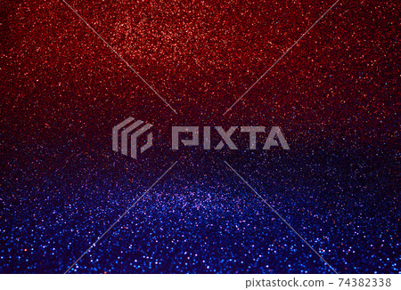 Red and blue glitter and sparkling glitter. Colour transition through the middle 74382338