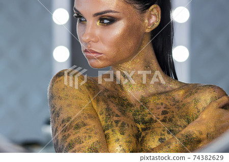 Sensual woman with snake on neck Sensual woman with snake on neck 74382629