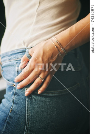 Tender jewerly on female hand, close up shot Tender jewerly on female hand, close up shot 74383975