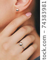 Tender jewerly on female hand, close up shot 74383981