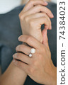 Tender jewerly on female hand, close up shot 74384023