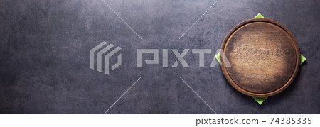 Pizza or bread cutting board for homemade baking on table. Food recipe concept 74385335