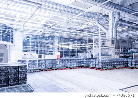 engine parts in a car factory 74385571