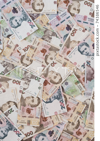Paper money different denominations, Ukrainian hryvnia in denominations 50,100, 200 hryvnias, new money 74386546
