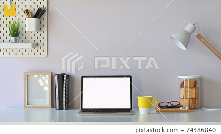 Workspace blank screen computer  and office equipment is on the table. Modern working desk concept. 74386840