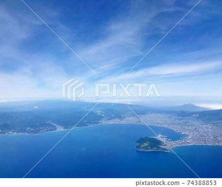 View from an airplane of Hakodate and Oshima Peninsula that shines in the blue sky View from an airplane of Hakodate and Oshima Peninsula that shines in the blue sky 74388853