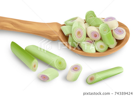 Fresh Lemongrass slices in wooden spoon isolated on white background with clipping path and full depth of field 74389424
