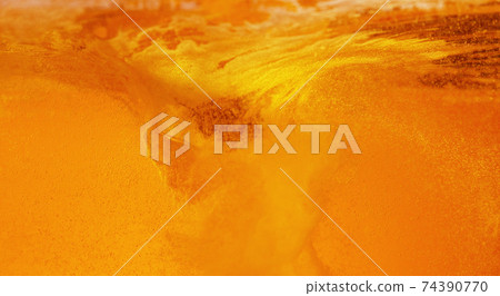 Detail of pouring beer creating twister shape 74390770