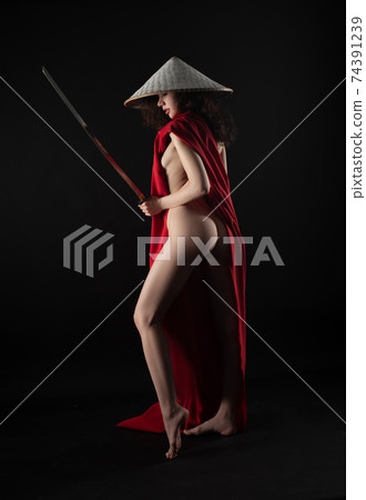 naked slender woman in a red cape and an Asian hat with a katana in her hand image of a samurai naked slender woman in a red cape and an Asian hat with a katana in her hand image of a samurai 74391239