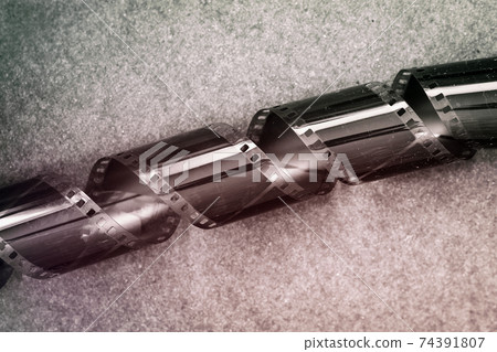 Old black and white Negatives photographic film with scratches, cracks, dust 74391807