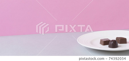 Chocolate on the plate. Break time, women's materials, pink walls, Valentine's Day, etc. 74392034