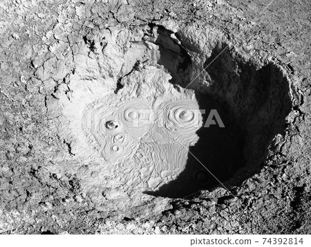 Hot mud pot in geothermal area Hot mud pot in geothermal area 74392814
