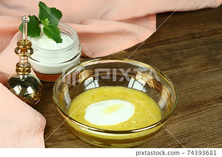 Mixed homemade facial mask against wrinkles Mixed homemade facial mask against wrinkles 74393681