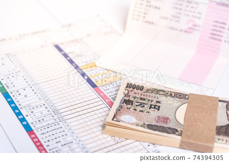 Tax returns, wads and passbooks Tax returns, wads and passbooks 74394305
