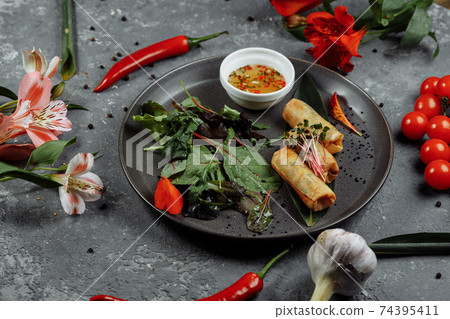Spring rolls with shrimp with sweet chili sauce. Asian cuisine Spring rolls with shrimp with sweet chili sauce. Asian cuisine 74395411