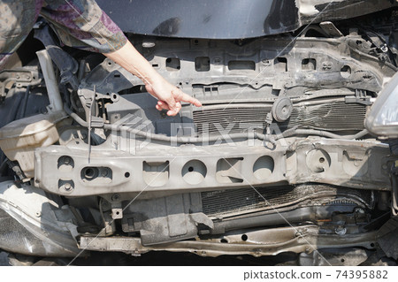 crashed damaged broken car. automobile crash accident crashed damaged broken car. automobile crash accident 74395882