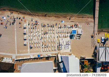 Aerial View of Crowd of People on the Beach 74396409