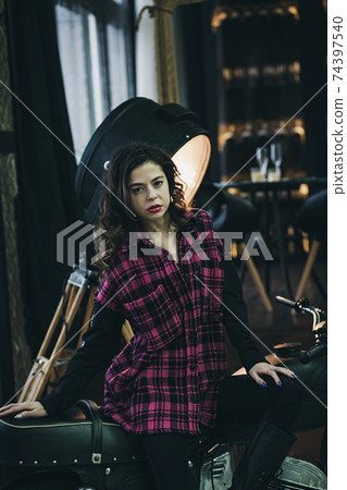 Beautiful motorcycle brunette woman Beautiful motorcycle brunette woman 74397540