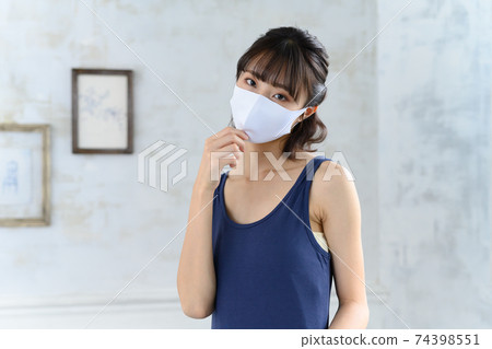 Woman in mask 74398551