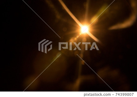 Abstract Natural Sun flare on the black 74399807