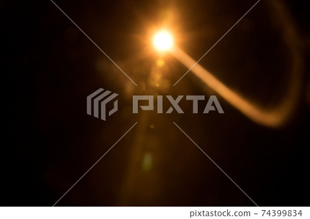 Abstract Natural Sun flare on the black Abstract Natural Sun flare on the black 74399834