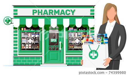 Woman holding drugstore bag in front of pharmacy 74399980