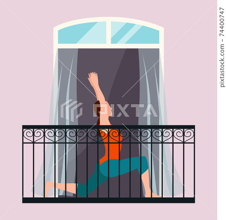 Woman doing yoga relaxation exercise on the balcony at home, taking care of her health and body 74400747
