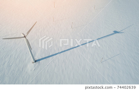 Wind power plant in winter filed Wind power plant in winter filed 74402639